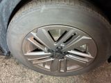 a close up of a tire on a car ' s rim