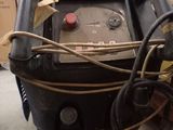a machine that is sitting on the floor in a warehouse