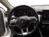 the interior of a car with a steering wheel and dashboard controls