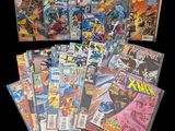 some of the comics are spread out on a black background