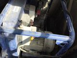 a blue machine that is sitting in the garage