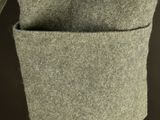 a close up of a person ' s coat with a pocket
