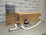 a box with a water tank and hoses on a table