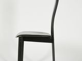 a black chair with a black seat and a white background