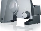 a close up of a machine that is on a white surface