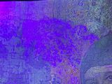 painting of a man with a beard in front of a purple light