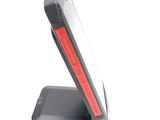 a cell phone that is sitting on top of a stand