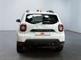a white car that is parked in a room