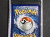 a close up of a pokemon card on a table