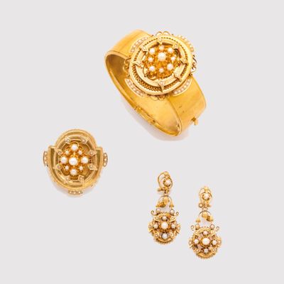 three pieces of gold jewellery including a ring, earrings and a ring