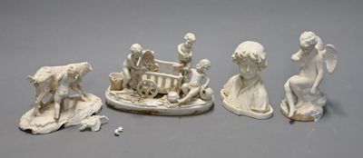 four figurines that are sitting on a table