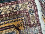a close up of a rug with a pattern on it