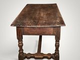 an old wooden table with a wooden top on a white background