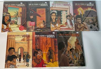 un grand nombre de livres posés sur une table