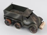 a toy truck that is sitting on a white surface