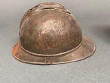 two helmets that are sitting on a table