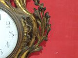 a clock that is hanging on the wall in the room