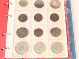 a picture of a binder with coins in it