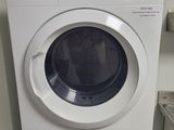 an image of a washer and dryer in a laundry room