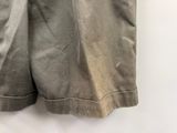 a close up of a pair of shorts hanging on a wall