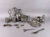 a lot of silver items that are on the table