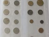a lot of coins in a plastic bag on a table
