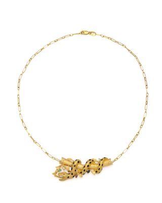 un collier plaqué or orné de fleurs et de feuilles sur une chaîne