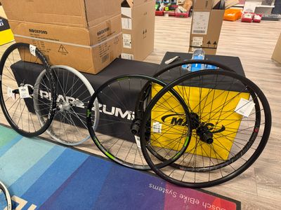 two bikes that are sitting next to each other on the floor