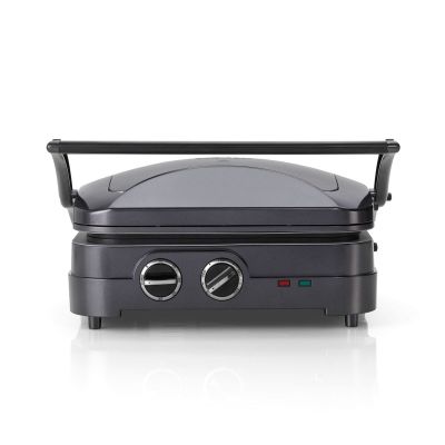 an image of a black and silver grill on a white surface