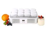 a blender with six jars of fruit and a jar of yogurt