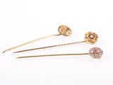 three pairs of gold and diamond hair pins