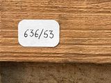 a close up of a wooden box with a label on it