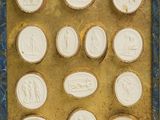 a picture of a picture of a collection of ancient coins