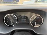 a dashboard of a car with three different gauges on it