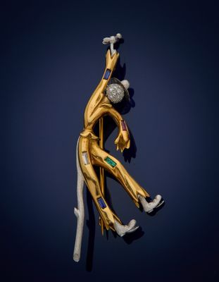 an image of a gold figurine of a man holding a baseball bat