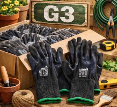 a box of gardening gloves and gardening tools on a table