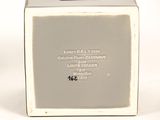 a white box with a black and white picture on it