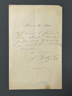 un bout de papier sur lequel figure une écriture manuscrite