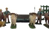 plusieurs figurines représentant des hommes à cheval et une calèche