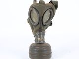 an old gas mask on a white background