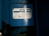 a picture of a blue machine with a sign on it