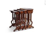 trois tables en bois avec des plateaux en marbre et une cage à oiseaux posée dessus