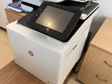 a printer that is sitting on top of a desk