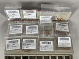a lot of screws and nuts in a box