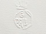 the logo of the company is shown on the white paper