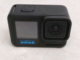 a close up of a gopro camera on a white surface