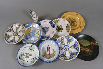 a lot of plates that are sitting on a table
