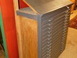 an image of a metal filing cabinet in a room