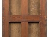 an old wooden window with a sign on the side of it