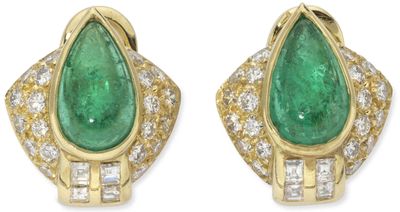 a pair of emerald and diamond earrings